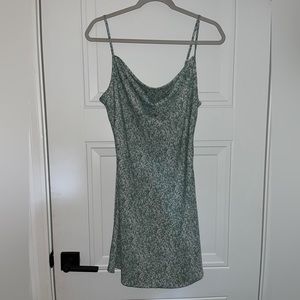 Mini dress. Nice fit around the waist but still a little flowy.